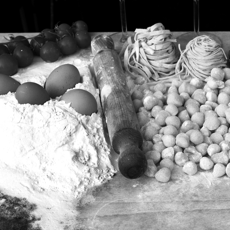 Black and white image of pasta making ingredients